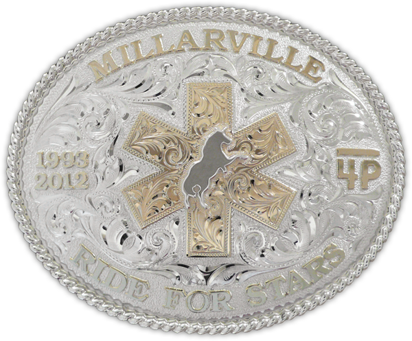 Custom made for Lara Palmer by the Millarville Ride for Stars, this sterling silver and 10kt gold buckle is completely engraved by hand.