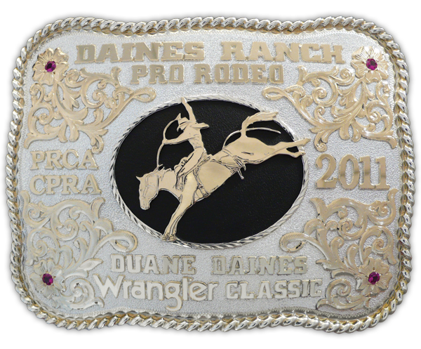The Daines Ranch Pro Rodeo (Innisfail, Alta.) buckle features the custom silhouette of Canadian Champion saddle bronc rider Duane Daines on Calgary Stampede's Moon Rocket