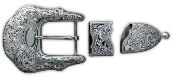 While buckles are the “backbone” of the business, Olson Silver also creates additional works for clients, including this silver filagreed sterling buckle set.