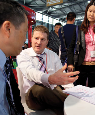 CBI president Rob Meijer passionately discusses Canadian quality with a qualified Chinese buyer.