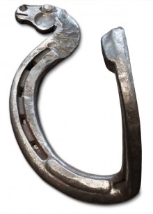 A hook with a forged horse head for decoration