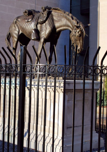The War Horse at the Virginia Historical Society, Richmond, Va. The bronze horse sculpture is mounted on a six-foot base and surrounded by a high iron fence. Photo Virginia Historical Society.