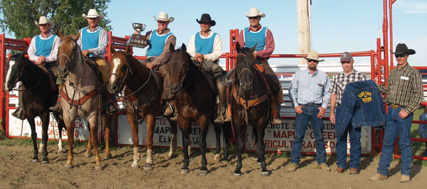Winners of the 27th Annual Maple Creek Ranch Rodeo (MCRR), from left: Trevor Murphy, Shay Wilson, Fred Blakley (holding the Hereford Cup), Arron Gordon, and Darryl Gold. On foot: MCRR committee member Alex Robinson, Larry Russell (repping for the Forbes), and MCRR committee member John Beierbach. Photo by Terri Mason.
