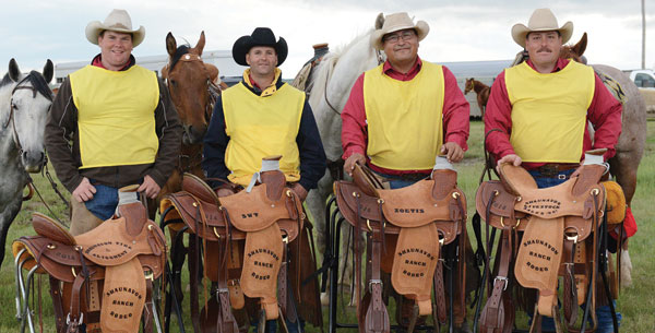 Back-to-back Champions FWDP. From left: Ross Davidson (captain), Riley Pritchard, Shawn (Shawn-Boy) Francis and Chris Williamson with their 2014 trophy saddles. Photo courtesy of Shaunavon Ranch Rodeo.