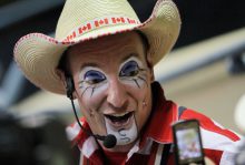 Crash Cooper, a Canadian rodeo clown, gets his photo taken during the Ram National Circuit Finals Rodeo at the State Fair Arena in Oklahoma City, Saturday, March 31, 2012. Photo by Garett Fisbeck, For The Oklahoman